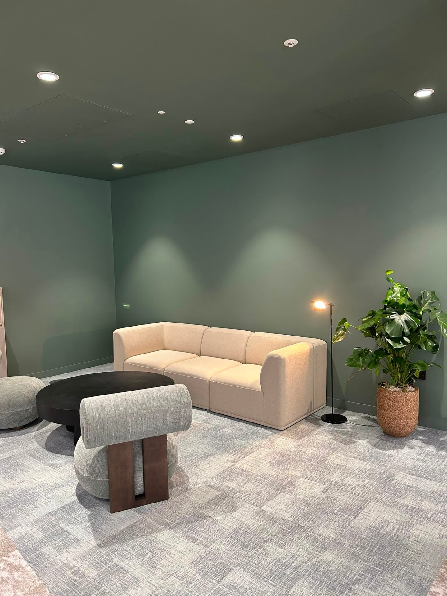 Home improvements sage green breakout area by MOVIR INTERIORS